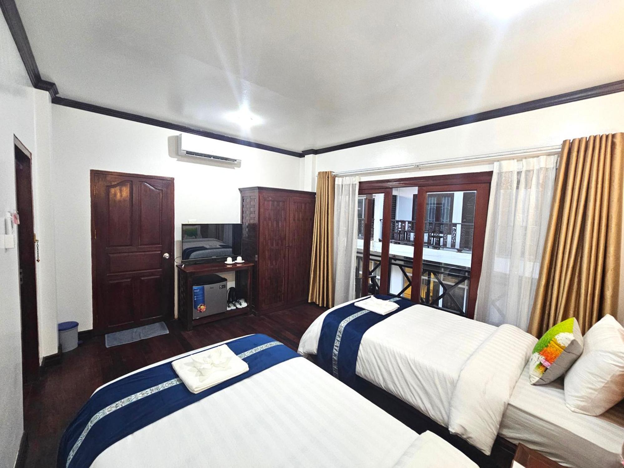 Win Hotel Ванг Виенг Екстериор снимка
