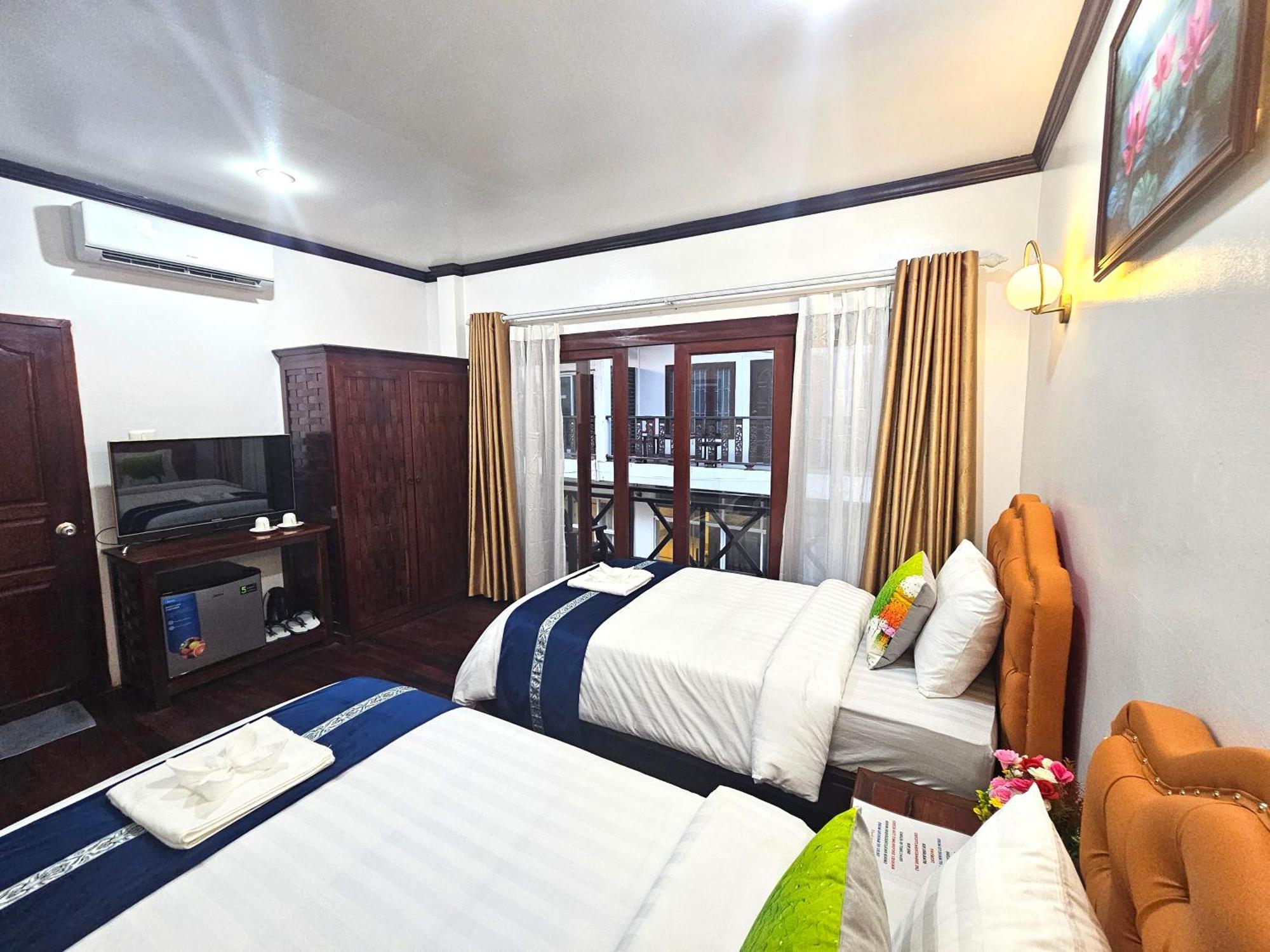 Win Hotel Ванг Виенг Екстериор снимка