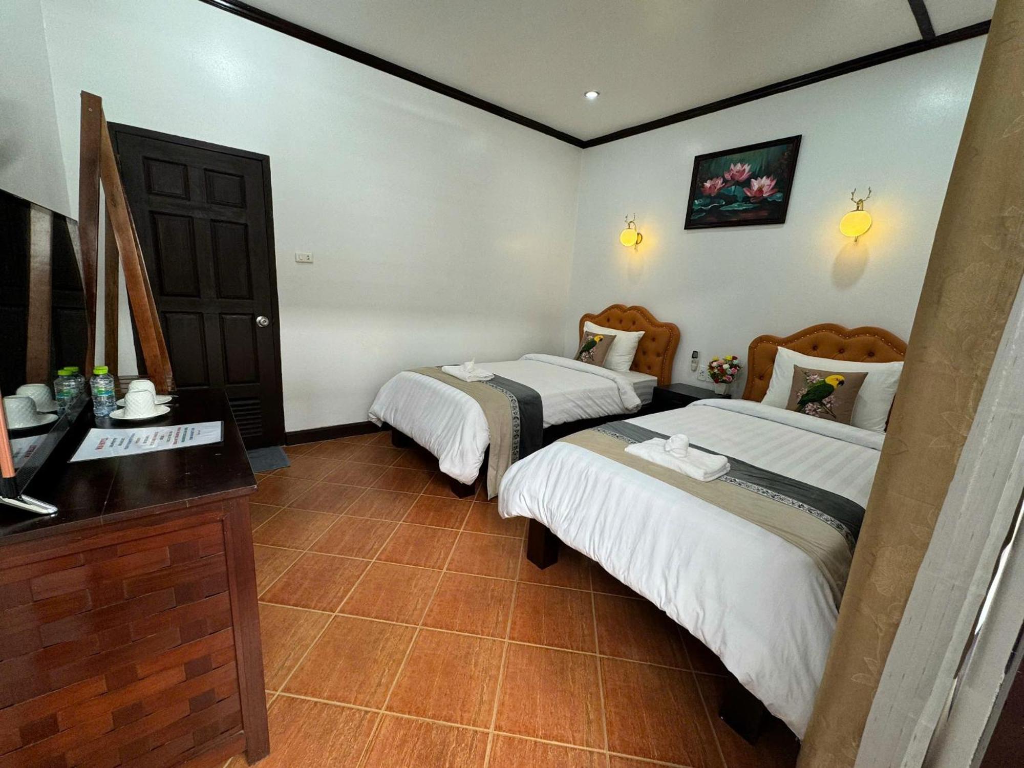 Win Hotel Ванг Виенг Стая снимка